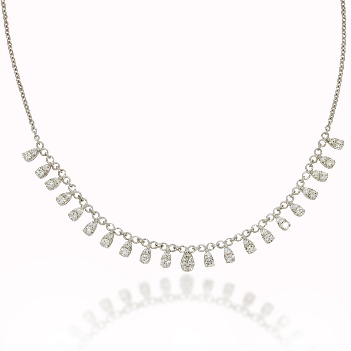 Sparkling drops necklace Gracefully suspended from a delicate chain. The diamond pendants radiating a majestic and opulent charm.