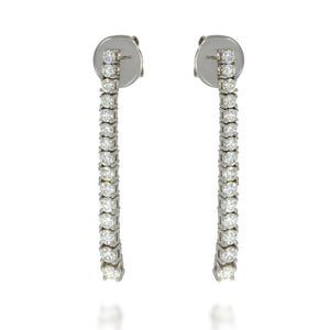 Long strip bar studs diamonds earings, 15 diamonds on each earing set on 14k white gold, arranged from the smallest width to the largest.