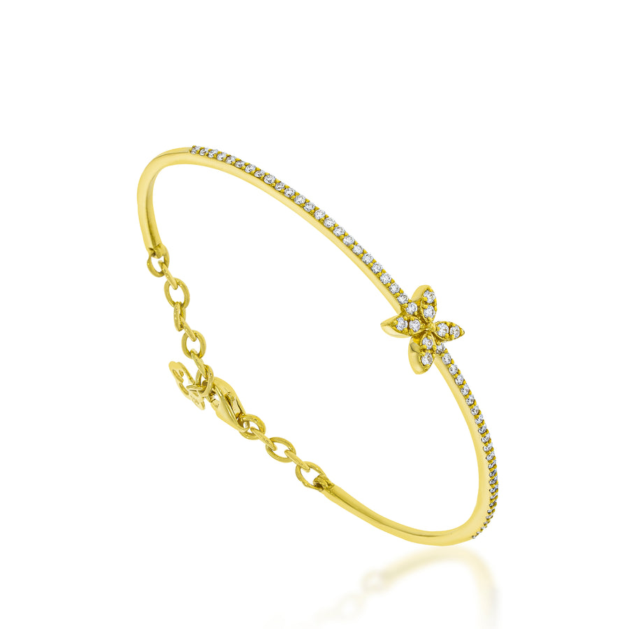 Gold Bangle in a special shape of a flower set with 0.52ct. diamonds, bracelet that loops to enlarge and reduce the size.