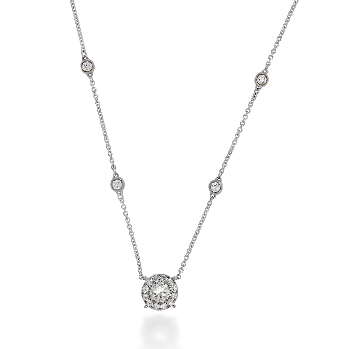 A stunning Round shape diamonds pendant necklace, centre big diamond 0.57ct, surrounded  with small diamonds & 6 diamonds  sparkling on chain.