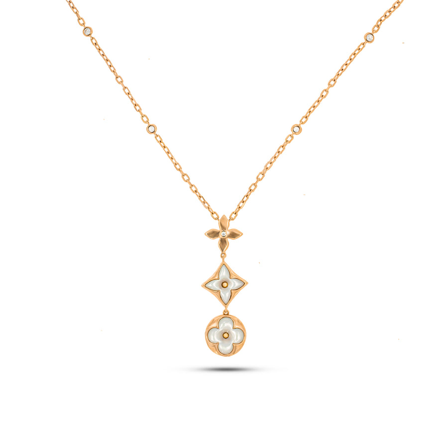 Trail necklace with 3 Specials flowers pendant cast in 18K rose gold, 2 perfect Mother of pearl & 9 brilliant cut round diamonds.