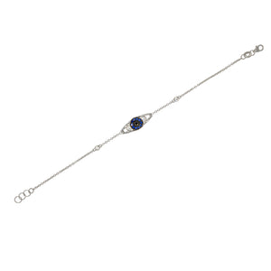 Evil Eye Bracelet 18k white gold set with blue sapphire and diamonds complemented by black diamond. blending of symbolism and sophistication