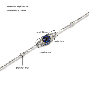 Evil Eye Bracelet 18k white gold set with blue sapphire and diamonds complemented by black diamond. blending of symbolism and sophistication