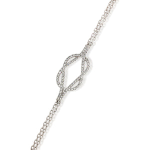 Delicate 18k white Gold Diamonds bracelet. adorning the criss-cross diamonds pattern. create a harmonious blend of sparkle and color.