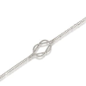 Delicate 18k white Gold Diamonds bracelet. adorning the criss-cross diamonds pattern. create a harmonious blend of sparkle and color.