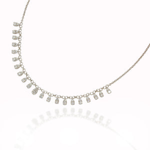 Sparkling drops necklace Gracefully suspended from a delicate chain. The diamond pendants radiating a majestic and opulent charm.