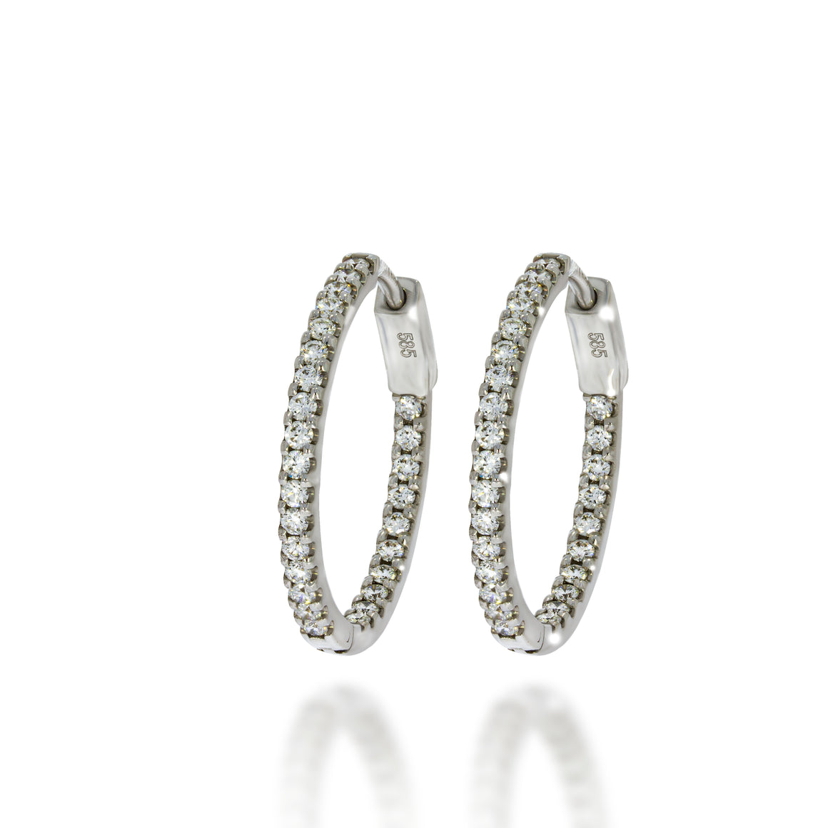 Impressive, powerful and unique appearance hoop earrings 14k white gold, set all around with 0.8ct drawing admiration from all angles.