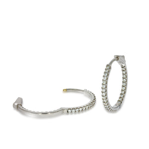 Impressive, powerful and unique appearance hoop earrings 14k white gold, set all around with 0.8ct drawing admiration from all angles.