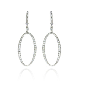 Large Dangling Diamond ellipse Earrings in 18k white Gold, create a stunning display of light, adding a touch of glamour in any movment.