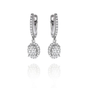 Amazingly beautiful hanging diamond earrings, horseshoe shape set with diamonds in the front And an hanging diamonds ellipse pendant.