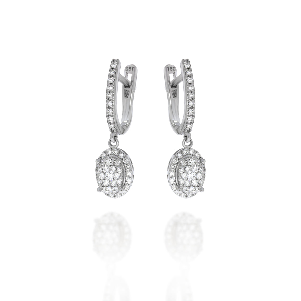 Amazingly beautiful hanging diamond earrings, horseshoe shape set with diamonds in the front And an hanging diamonds ellipse pendant.