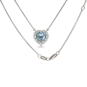 Timeless thick filigree swirl ocean blue diamond Heart shape pendant. 18k white gold set with 0.72ct glamour ocean blue diamond.