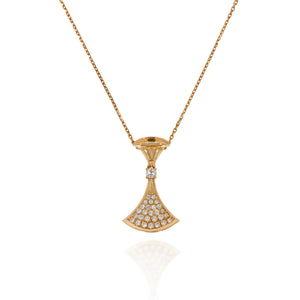 Necklace pendant skirt shape 14 carat pink gold set with 0.40 carat round diamonds. Diva dream pendant Bulgari Bvlgari. Luminous female diamond pendant.