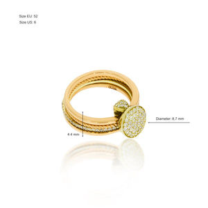 A collection of ring 4 gold rings connected, one in a wavy structure, one set with diamonds, connected by a clasp set with diamonds.