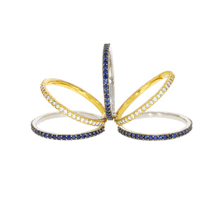 Unveil the epitome of luxury with our stunning Four Connected Rings two-tone 18k gold Diamonds and Blue Sapphire your unique style and grace