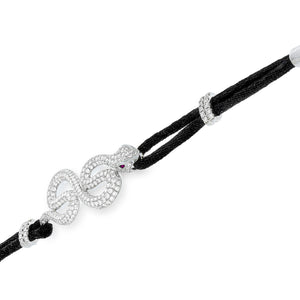 Black Rope Bracelet holds a diamond snake set with 344 sparkling round cut diamonds, 2.04ct. and 2 red rubins gemstones | 18K White gold.