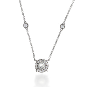 A stunning Round shape diamonds pendant necklace, centre big diamond 0.57ct, surrounded  with small diamonds & 6 diamonds  sparkling on chain.