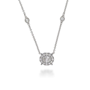 Oval shape diamonds pendant necklace, at the centre of pendant big Oval diamond 0.56ct, halo with rounds small diamonds & with sparkling diamonds on chain