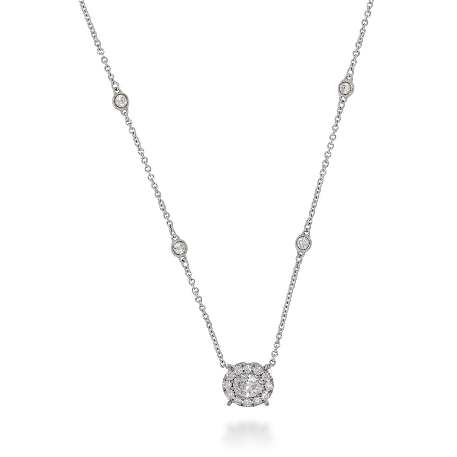 Oval shape diamonds pendant necklace, at the centre of pendant big Oval diamond 0.56ct, halo with rounds small diamonds & with sparkling diamonds on chain
