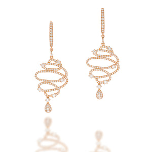 Masterpiece Earrings! Long earing spiral design cast from 18K rose gold and set with 274 sparkling diamonds.