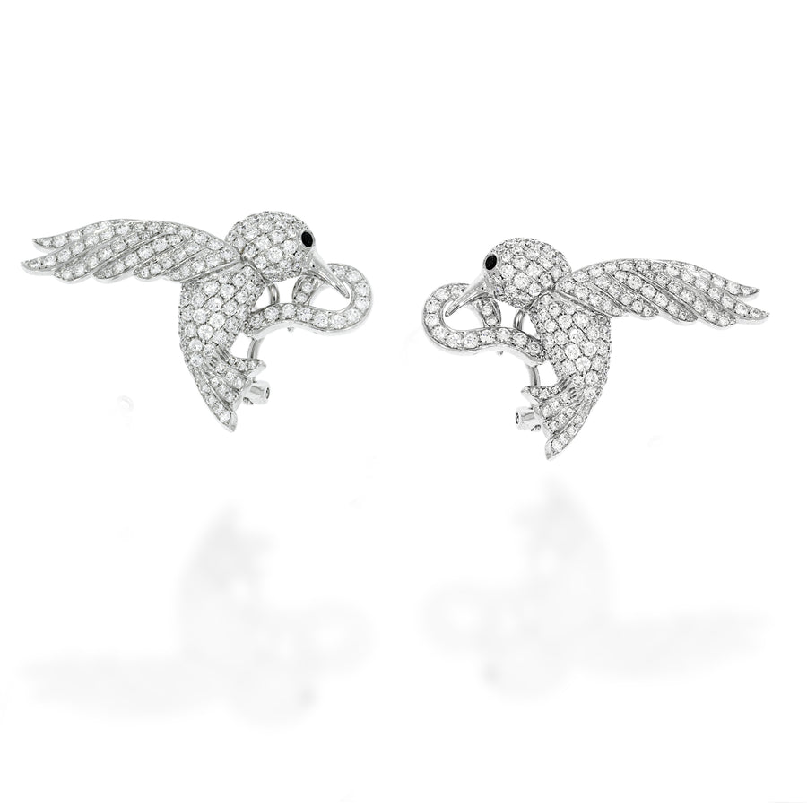 Luxurious bird shape 18K white gold pave diamonds earrings, drop earing with 6 exclusive PS Blue Topaz gems.