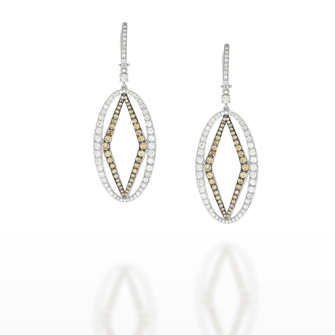 Luxurious oval 18K white gold drop dangle earrings pave diamond wraps an exclusive 18k white gold triangle set with Champagne Diamonds.